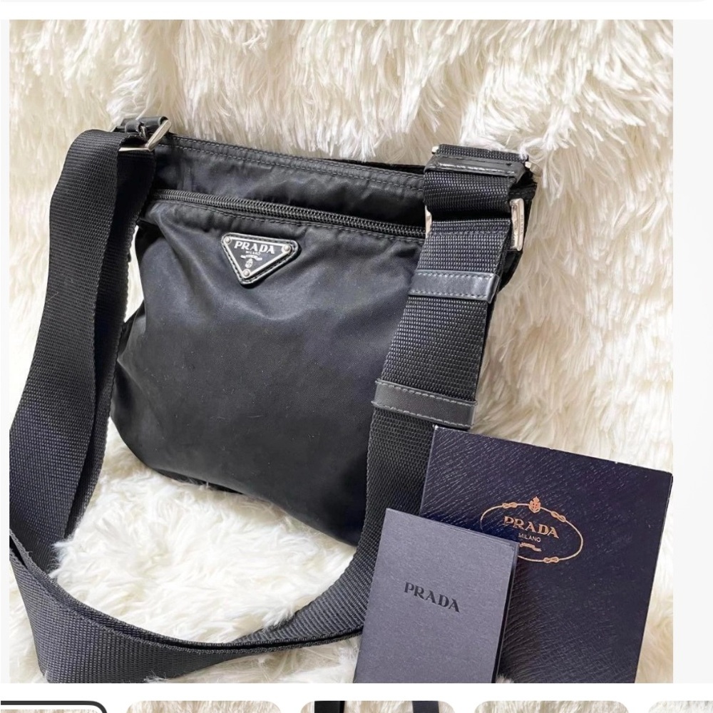 Prada Black Messenger Bag with Adjustable Strap and Sleek Design